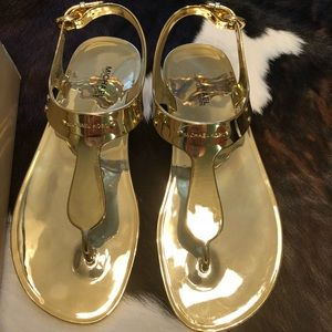 Gold Michael Kors jelly sandals